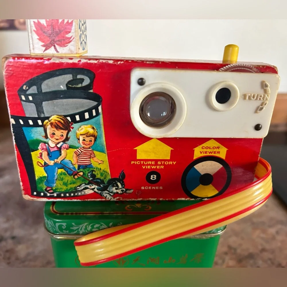 Fisher-Price #784 Classic Toy Story Camera 8 picture frames. 1960’s Fully works